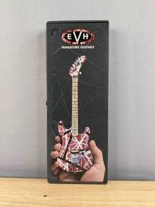 lot 56 image: EVH Eddie Van Halen Officially Licensed Miniature Guitar