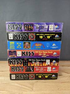 lot 59 image: 7 KISS Album Cover Puzzle Boxes (for Display)