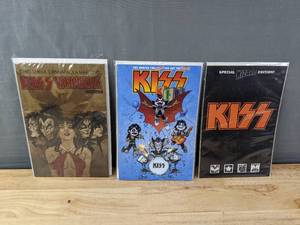 lot 132 image: Set of 3 KISS Comic Books Including Dynamite KISS Vampirella, IDW KISS Kids and KISS Special Wizard Edition