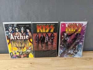 lot 107 image: Set of 3 KISS Comic Books Including Archie Meets KISS, IDW Number 1 You Wanted the Best You Got the Best and Dynamite Blood in Stardust