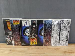 lot 148 image: 7 Total Comics KISS Covers A-G Dynamite