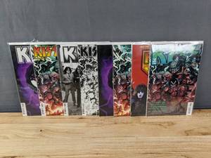 lot 150 image: 8 Total Comics KISS Dynamite Covers A-G and Exclusive Cover #2