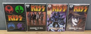 lot 128 image: 4 IDW KISS Dressed to Kill Part 1 Comic Books #1 CVR RI-A, #1 CVR B and #1 CVR A and KISS Issue #1 CVR RE