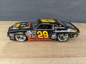 lot 189 image: KISS 124 Scale NASCAR Diecast 1971 Pontiac GTO Featuring Kevin Harvick #29