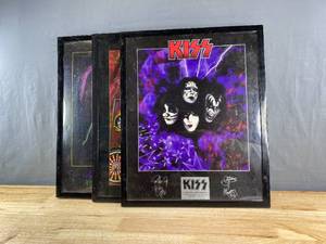 lot 15 image: 3 Framed KISS Commemorative Edition Posters