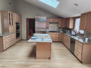 lot 6 image: Kraftsmaid Kitchen Cabinets and Countertops including Built-Ins and Island