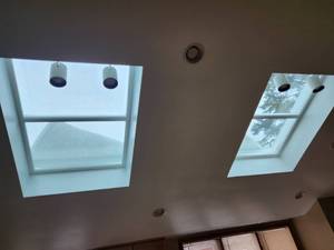 lot 8 image: Lot of (2) Skylight Windows with a set of 4 Track Lights