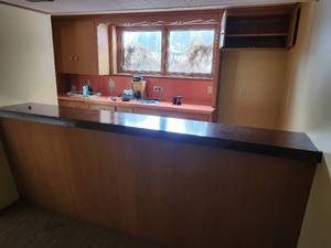 lot 25 image: Bar - Cabinets, Countertop, Sink, Stove Top