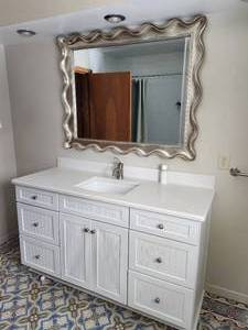 lot 36 image: Bathroom Vanity  Mirror  SinkFaucet
