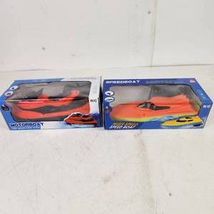 Lot Of Two New Water Toys Bright Orange Boat And Jet Ski