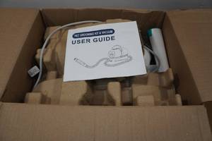 lot 18 image: Pet Grooming Kit & Vacuum