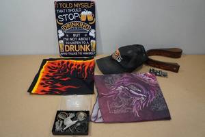 lot 205 image: Assorted SturgisMotorcycle Gear with Metal Sign