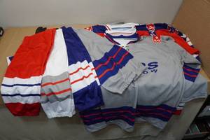 lot 265 image: 4 Hockey Jerseys with 4 Pairs of Hockey Socks