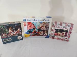 lot 23 image: Set of 3 Holiday Jigsaw Puzzles