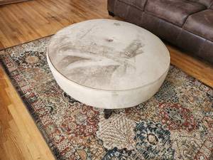 lot 39 image: Round Beige Fabric Ottoman