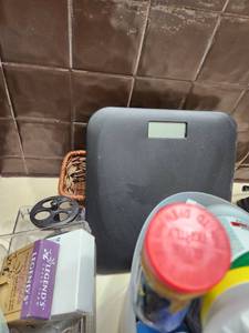 lot 60 image: Digital Bathroom Scale with Toiletry Bundle