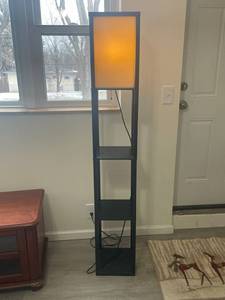 lot 104 image: Modern Black Floor Lamp with Shelves