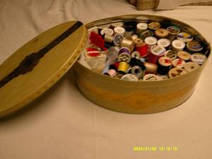 Candy Tin full of Sewing Thread and Stuff