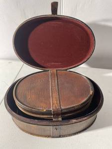 lot 104 image: Vintage Leather Oval Storage Box Set with Red Lining
