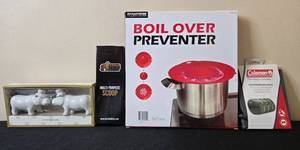 lot 71 image: Kitchen Accessories Set Boil Over Preventer, Hippo Salt and Pepper Shakers, Multi-Purpose Scoop, Compression Sack