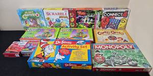 lot 86 image: Collection of Board and Puzzle Games Including Monopoly, Connect 4, and Scrabble Junior