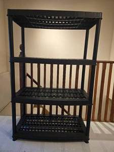 lot 98 image: Black 4-Tier Plastic Storage Shelving Unit