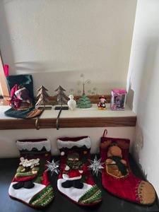lot 212 image: Christmas Decor Collection with Stockings, Ornaments, and Cards