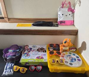 lot 223 image: Assorted Kids Fun Pack with Toy, Sunglasses, Yarn, and More
