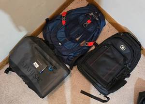 lot 297 image: Set of 3 Backpacks Stahlsac Waterproof, Ogio, and Outdoor Products