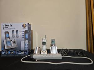 lot 305 image: VTech 3 Handset Connect to Cell Answering System with Power Strip