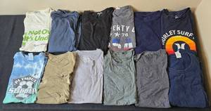 lot 409 image: Set of 12 Assorted Graphic and Plain T-Shirts in XL to XXL Sizes