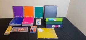 lot 102 image: Assorted School Supplies with Notebooks, Binders, and Glue Sticks