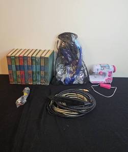 lot 124 image: Colliers Junior Classics Book Set, Guitar Cables, Mini Sewing Machine