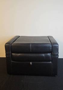 lot 144 image: Convertible Black Faux Leather Ottoman Chair