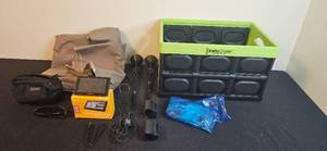 lot 255 image: InstaCrate Collapsible Storage Bin with Garmin GPS Bundle