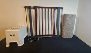 lot 270 image: Baby Safety Gate, Step Stool, and Carpet Roll Bundle
