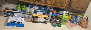 lot 37 image: Mixed Household and DIY Items Lot with Light Bulbs, Cleaners, and Hardware