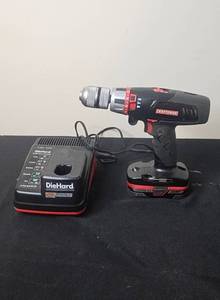 lot 47 image: Craftsman 12 in. Hammer Drill with Battery Charger and Carry Bag