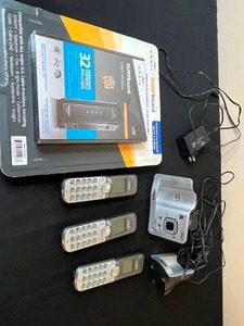 lot 344 image: ARRIS SURFboard DOCSIS 3.0 Cable Modem with VTech 3-Handset Phone System