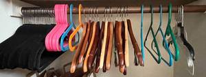 lot 401 image: Assorted Set of Clothes Hangers Including Plastic and Wooden Designs