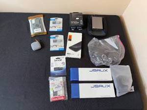 lot 351 image: Lot of Electronics and Accessories Including SSDs, Flash Drives, and More