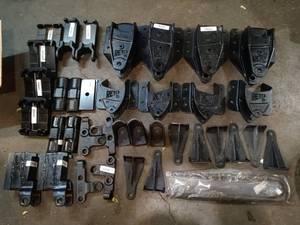 lot 77 image: Large HEAVY lot of new semi-truck suspension parts (see pics for part #s)