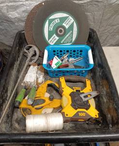 lot 98 image: Masonry cutting wheels, Tape measure, stapler and other masonry tools
