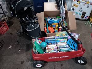 lot 23 image: Wagon full of toys, Stoller, New Easel
