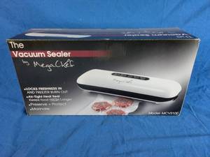 lot 51 image: MegaChef Home Vacuum Sealer and Food Preserver with Extra Bags
