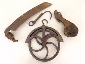 Lot of Antique Iron Pulleys, Scythe, etc.