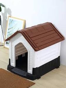 lot 87 image: Plastic Dog House - Brown and White