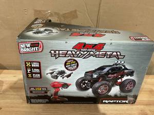 lot 389 image: New Bright (110) Ford F-150 Battery Remote Control Heavy Metal 4X4 Black Truck