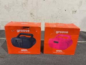 lot 214 image: LOT OF 2 Onn. Portable CD Boombox with Digital FM Radio