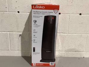 lot 502 image: Lasko 22 1500W Oscillating Ceramic Tower Space Heater with Remote, Black